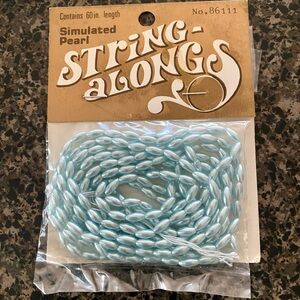 String-Alongs Simulated Pearl Craft String - Light Blue 7 packets